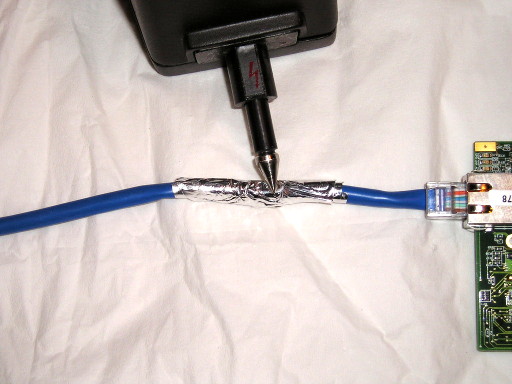 ESD current injection using aluminum foil on cable
