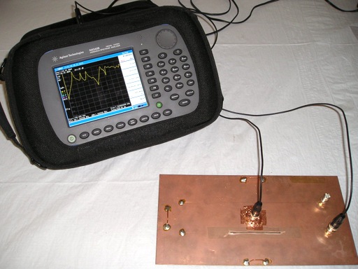 test setup with board and spectrum analyzer